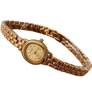 Elegant gold vintage style women's jewelry watch with small round dial and metal chain band