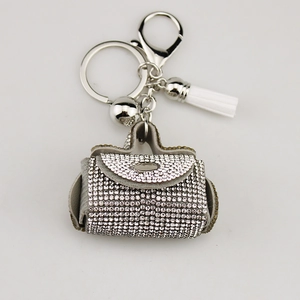 Fashionable sparkling rhinestone handbag keychain with white tassel and silver lobster clasp