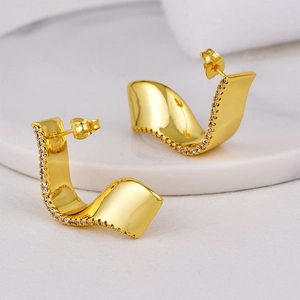 Irregular geometric ribbon earrings in gold plating with white micro-pave cubic zirconia
