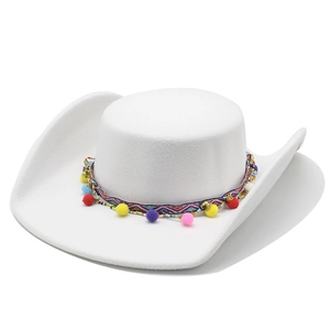 Detail of white felt cowboy hat featuring ethnic colorful ribbon and vibrant fur pom-poms