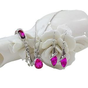 Elegant silver jewelry set with rose red teardrop crystals and sparkling zircons