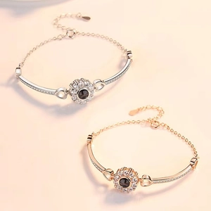 Projection bracelets in silver and rose gold with gemstone and crystal accents