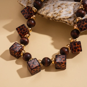 Retro wooden and leopard print resin beaded necklace for women in earthy brown tones
