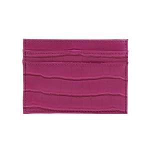 Detail of slim crocodile texture card holder in rose pink with refined stitching
