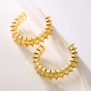 Elegant 18K gold-plated C-shaped earrings with yellow zircon baguette stones