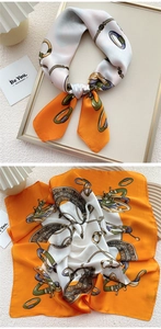 Detail of French vintage silk square scarf with orange chain and buckle print patterns