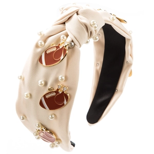 Détail du serre-tête noué beige avec perles et breloques de dinde de Thanksgiving