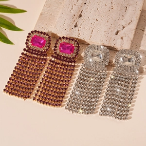 Luxurious rectangular rhinestone tassel drop earrings in magenta and silver finish