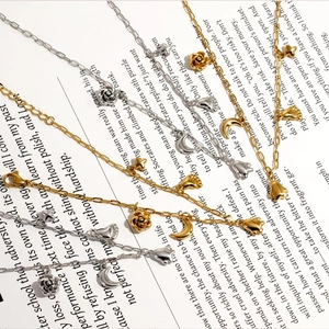 Stainless steel jewelry set featuring moon flower and footprint charms in gold and silver