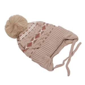 Boys knit trapper hat with geometric pattern and faux fur pompom for winter warmth