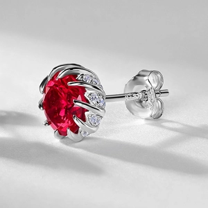 S925 sterling silver flower stud earrings featuring red lab-grown ruby and white side stones
