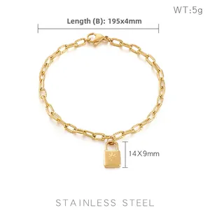 Detail showing 4mm gold stainless steel chain and 14x9mm padlock pendant with starburst
