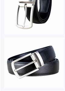 Close-up of premium black leather belt for men with a polished silver alloy buckle