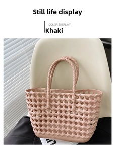 Detail of khaki hollow woven beach bag featuring intricate cross-knit texture