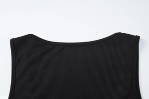 Detail of the high-quality ribbed knit fabric and neckline on this black slim fit tank top