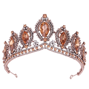 Detailed shot of baroque gold bridal crown with amber crystals and clear rhinestones