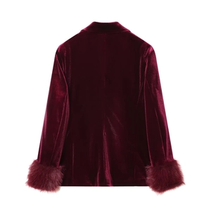Back view of burgundy velvet blazer featuring elegant fur trimming on the cuffs