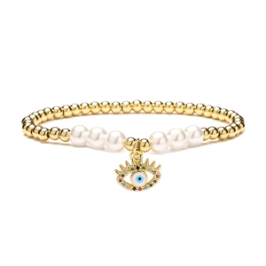 Gold-plated 4mm copper bead bracelet with evil eye charm and white pearls on white background