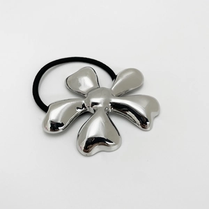 Detail of silver five-petal flower hair tie with high-elastic black rubber band