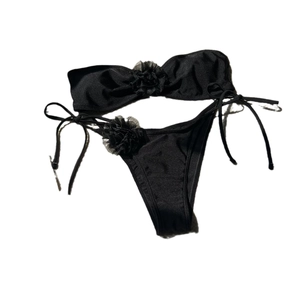 Solid black strapless bikini set with 3D floral accents and side-tie bottoms