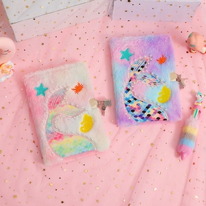 Detail of plush mermaid tail diary with sequins, pearls, starfish and a metal lock