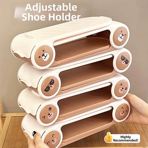 Detail of adjustable double-layer plastic shoe racks with cartoon bear face designs
