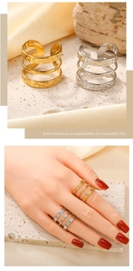 Detail of vintage triple-layered hammered texture open rings in gold and silver finish