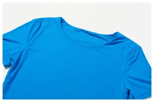 Detail of bright blue yoga top neckline in high-elastic moisture-wicking fabric
