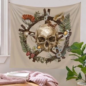Detail of bohemian tapestry featuring mushroom and skull motifs with Witchcraft Mystery text