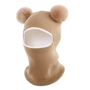 Detail of khaki rib-knit baby balaclava with two plush pom-poms and white trim edging