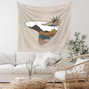Detail view of Bohemian wall tapestry with mountain patterns in minimalist interior