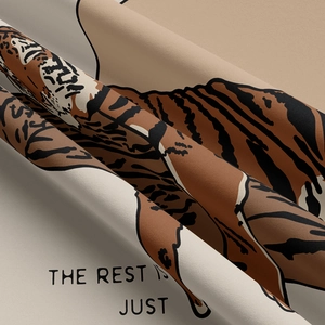 Bohemian tapestry with hand-drawn tiger pattern and decorative English lettering