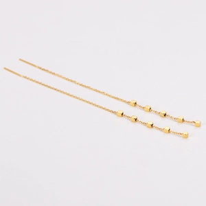 Elegant gold stainless steel drop earrings featuring tassel chains and mini cubes