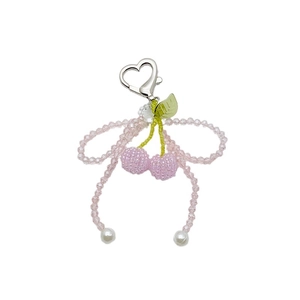 Pink crystal beaded cherry and bow keychain with white pearls on a silver heart clasp