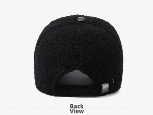 Rear view of black sherpa baseball cap with adjustable metal buckle and warm texture