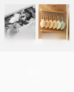 Pull-out wardrobe organizer with wooden base and metal hooks for space-saving storage