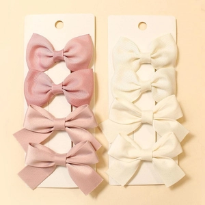 Set of 8 striped bows and satin hair clips in pink and beige on display cards