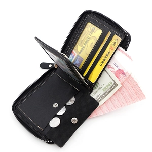 Men's tri-fold leather wallet featuring multiple card slots and snap coin pocket in black
