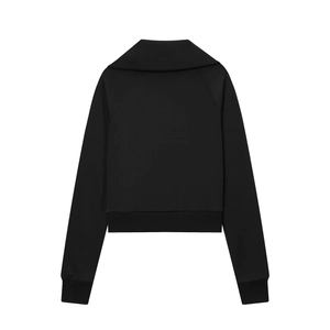 Detail view showing the back side of black zip-up fleece sweatshirt and trousers set