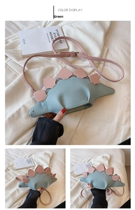 Detail of dinosaur crossbody bag with blue PU leather and pink spinal plates