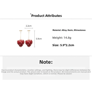 Detailed view of red resin strawberry earrings with rhinestones and size measurements