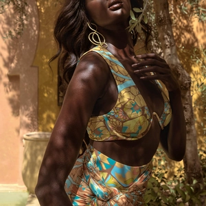 Detailed view of women's bikini with vibrant ethnic print and underwire support