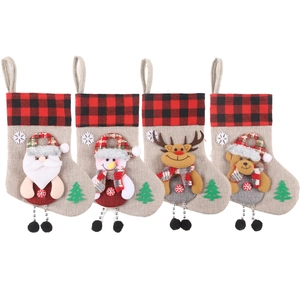 Set of four Christmas stockings with Santa snowman reindeer bear in red black plaid