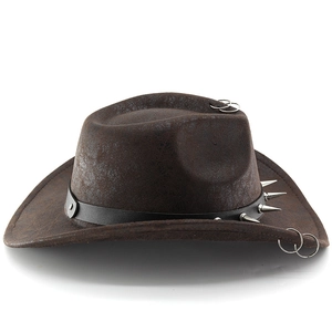 Close-up of brown punk style cowboy hat with silver rings and metal rivets detail