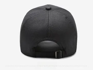 Rear view of black cotton baseball cap showing adjustable metal buckle and twill texture