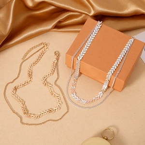 Double-layered gold and silver herringbone chain necklaces set with lobster clasp