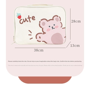 Detail view of cartoon storage bag showing dimensions 38x28x13cm with cute bear print