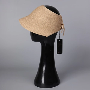 Detail of khaki paper knit open-top sun hat with bow on side and woven texture view
