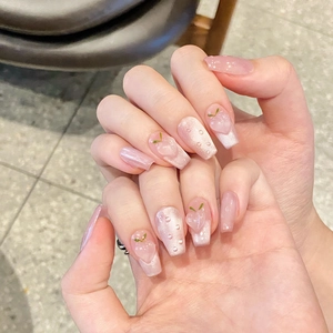 Faux ongles dégradés rose œil de chat avec décorations pêche 3D et goutte d'eau