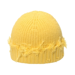 Bright yellow distressed knit beanie featuring trendy frayed edges and street style design